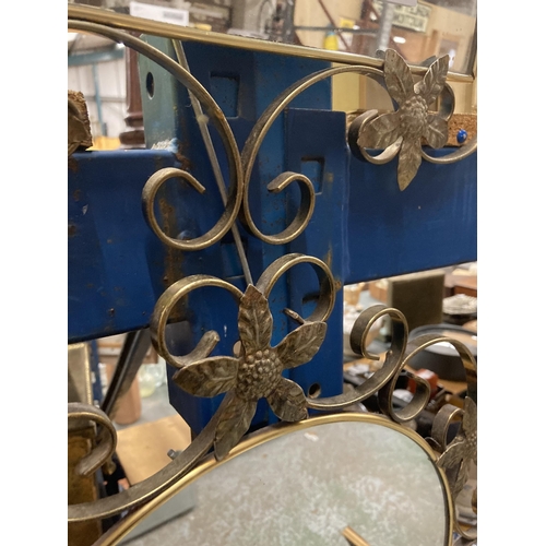 949 - TWO ORNATE BRASS ARCH SHAPED MIRRORS