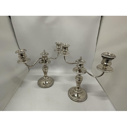 57 - A PAIR OF GOOD QUALITY SILVER PLATED TWIN BRANCH CANDLE HOLDERS