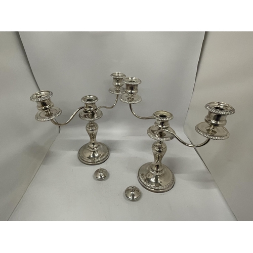 57 - A PAIR OF GOOD QUALITY SILVER PLATED TWIN BRANCH CANDLE HOLDERS