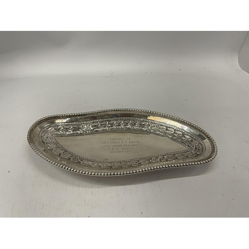 65 - A WHITE METAL PRESENTATION DISH, DATED 1971 ON PIN NEEDLE DESIGN FEET