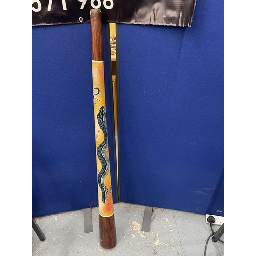 70 - AN ABORIGINAL DIDGERIDOO WITH SNAKE DESIGN