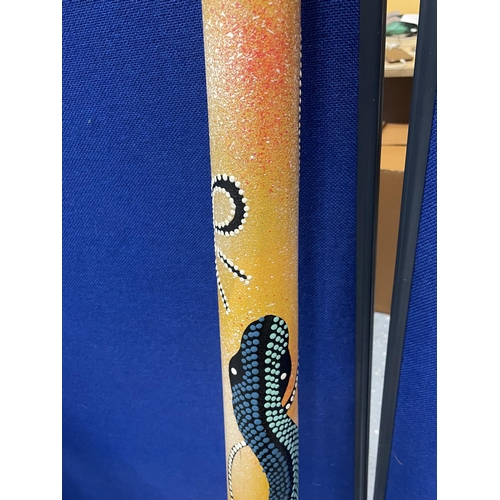 70 - AN ABORIGINAL DIDGERIDOO WITH SNAKE DESIGN