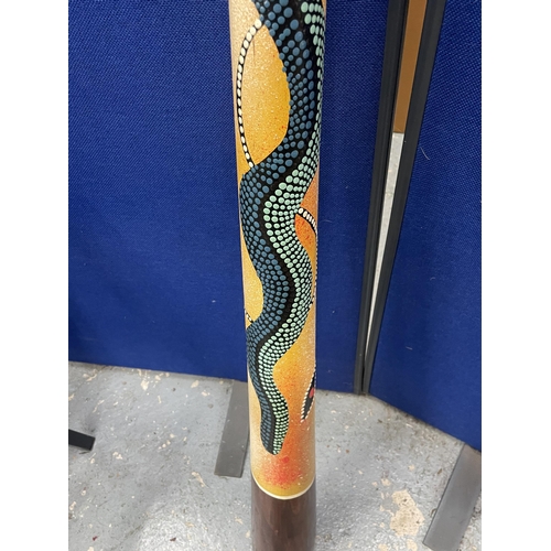 70 - AN ABORIGINAL DIDGERIDOO WITH SNAKE DESIGN