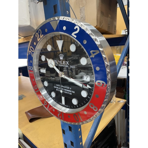 89 - A DEALERS WALL CLOCK