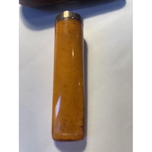 100 - AN AMBER CIGAR HOLDER WITH A HALLMARKED BIRMINGHAM SILVER COLLAR IN ORIGINAL PRESENTATION BOX