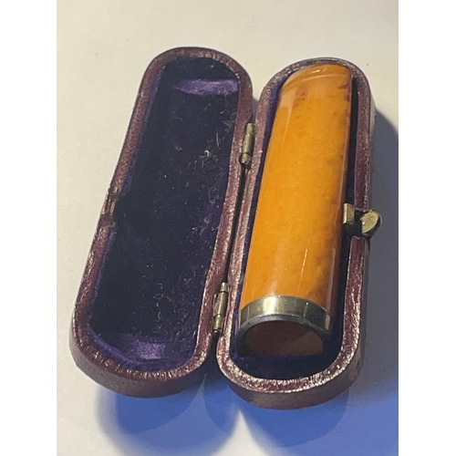 100 - AN AMBER CIGAR HOLDER WITH A HALLMARKED BIRMINGHAM SILVER COLLAR IN ORIGINAL PRESENTATION BOX