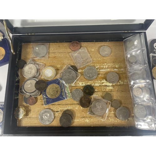 381 - A COLLECTOR’S DISPLAY CASE CONTAINING AN INTERESTING SELECTION OF COINS .