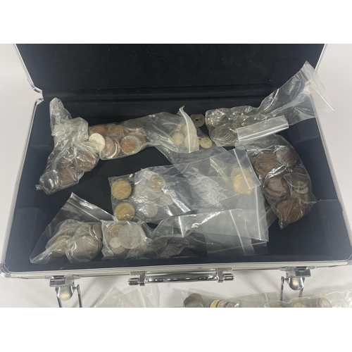 388 - ALUMINIUM CASE HOLDING BAGS OF WORLD COINS