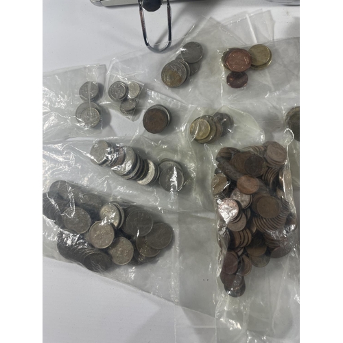 388 - ALUMINIUM CASE HOLDING BAGS OF WORLD COINS