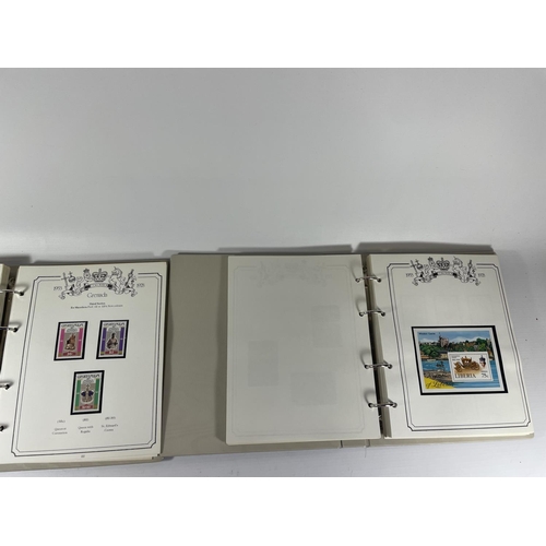 447 - A TWO VOLUME COLLECTION OF THE CORONATION ANNIVERSARY OF QE11 . A SUPERB , UNMOUNTED MINT COLLECTION