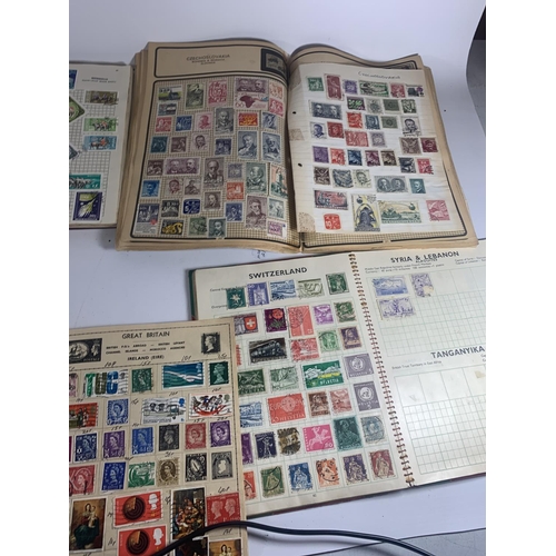 447A - EIGHT ALBUMS CONTAINING STAMPS FROM AROUND THE WORLD