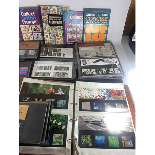 449A - A VERY LARGE COLLECTION OF FIRST DAY COVERS IN ALBUMS AND BOOKS RELATING TO STAMP COLLECTING