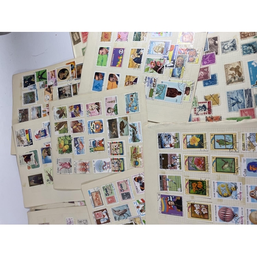 473 - A COLLECTION OF CUBAN STAMPS