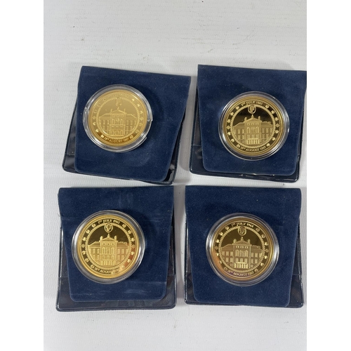 483 - FOUR GILT COINS IN CAPSULES RELATING TO PRINCESS DIANA