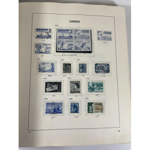 498 - AN ALBUM CONTAINING CANADIAN STAMPS