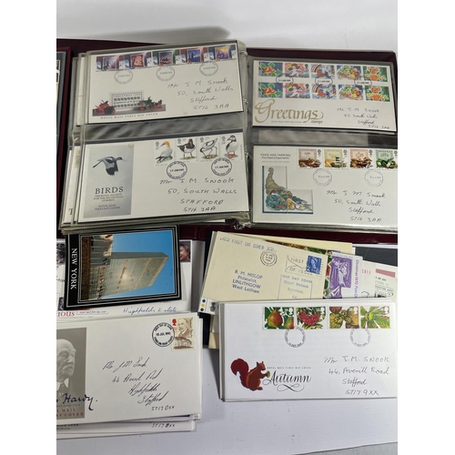 500 - A LARGE QUANTITY OF FIRST DAY COVERS SOME IN AN ALBUM