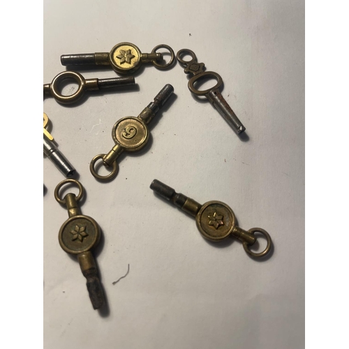 544 - A SET OF POCKET WATCH KEYS