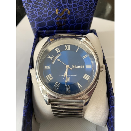 649 - A STAUER WRISTWATCH IN A PRESENTATION BOX SEEN WORKING BUT NO WARRANTY