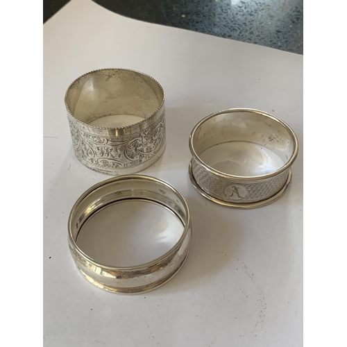 95 - THREE SILVER NAPKIN RINGS TO INCLUDE TWO HALLMARKED BIRMINGHAM