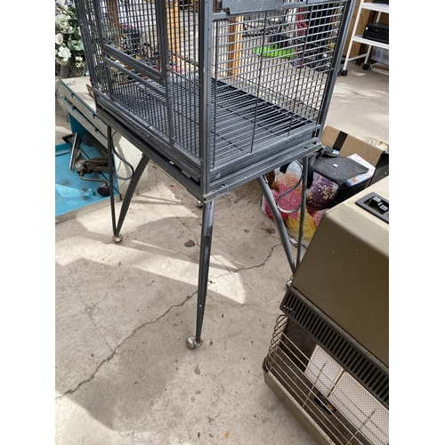 1764 - A LARGE METAL PARROT CAGE ON WHEELED BASE