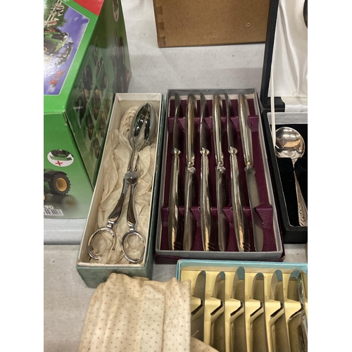 1010 - A LARGE QUANTITY OF BOXED VINTAGE FLATWARE TO INCLUDE FISH KNIVES AND FORKS, SERVING SPOONS, ETC