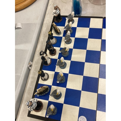 1015 - A NAUTICAL BOXED CHESS SET WITH RESIN FIGURES