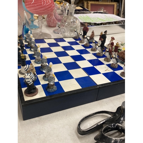 1015 - A NAUTICAL BOXED CHESS SET WITH RESIN FIGURES