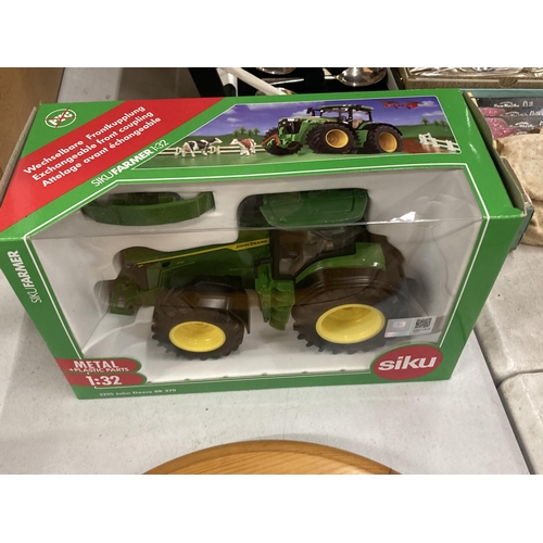 1019 - A BOXED SIKU MODEL OF A JOHN DEERE 8R- 370 TRACTOR REF NO 43329 SCALE 1:32