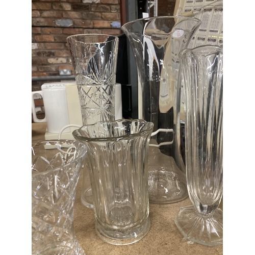 1024 - SIX GLASS VASES OF VARYING SIZES