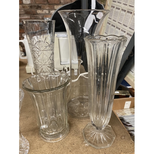 1024 - SIX GLASS VASES OF VARYING SIZES