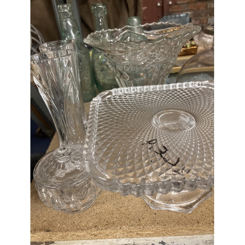 1030 - A LARGE QUANTITY OF GLASSWARE TO INCLUDE A CAKE STAND, TRINKET POT, VASES, CANDLESTICK ETC.,