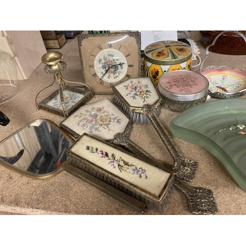 1033 - A QUANTITY OF VINTAGE ITEMS TO INCLUDE A PETIT POINT CLOCK AND VANITY SET, GLASS DRESSING TABLE SET,... 