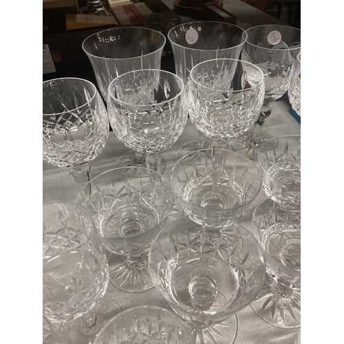 1036 - A LARGE QUANTITY OF CRYSTAL DRINKING GLASSES AND DESSERT BOWLS TO INCLUDE RED AND WHITE WINE, WHISKE... 