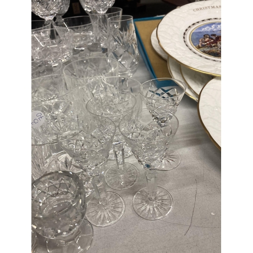 1036 - A LARGE QUANTITY OF CRYSTAL DRINKING GLASSES AND DESSERT BOWLS TO INCLUDE RED AND WHITE WINE, WHISKE... 