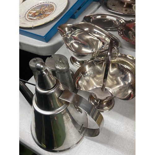 1038 - A QUANTITY OF SILVER PLATE TO INCLUDE A TEAPOT, OIL HOLDER, GRAVY BOAT, TRAYS, ETC.,