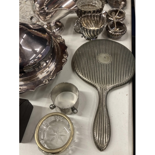 1048 - A LARGE QUANTITY OF SILVER PLATE TO INCLUDE A BUTTER DISH, MIRROR, FLOUR SHAKER, TRAY, NAPKINS, ETC.... 