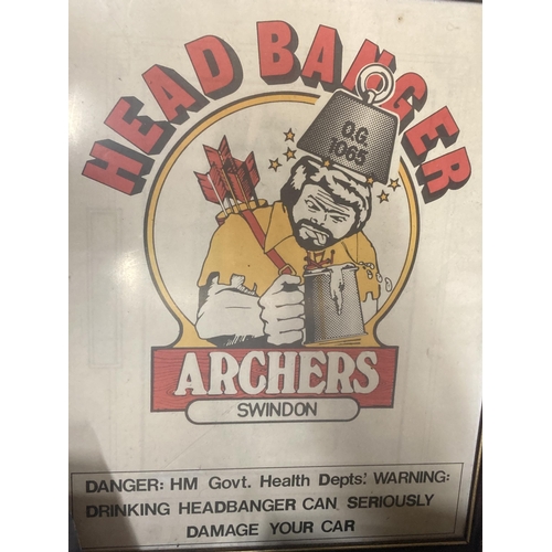 1055 - A FRAMED BREWERY POSTER ADVERTISING ARCHERS 'HEAD BANGER'