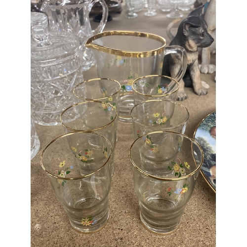 1066 - A VINTAGE GLASS LEMONADE SET FLORAL WITH GOLD RIM