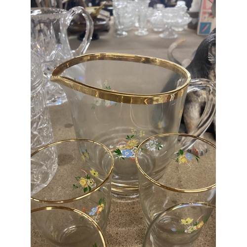 1066 - A VINTAGE GLASS LEMONADE SET FLORAL WITH GOLD RIM