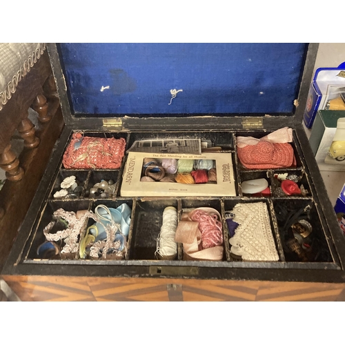 1075 - A VINTAGE WOODEN SEWING BOX WITH ACCESSORIES TOGETHER WITH TWO TAPESTRY WOVEN KNEELING STOOLS, LACE ... 