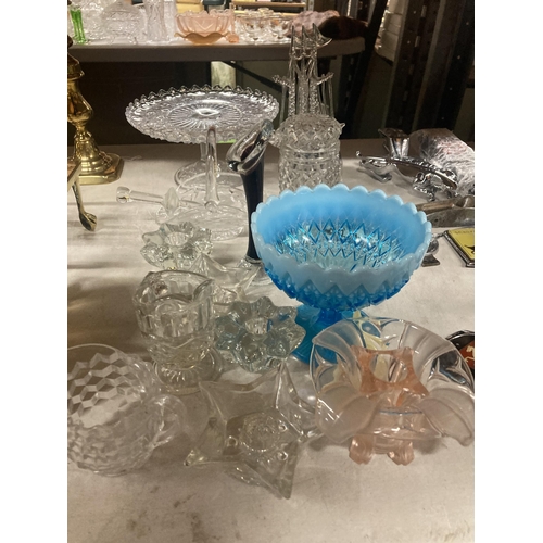 1087 - A QUANTITY OF GLASSWARE TO INCLUDE A ROSE BOWL, JUGS, VASE, CAKE STAND, SHIP MODEL ETC.,