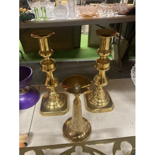 1088 - A QUANTITY OF BRASS AND COPPER TO INCLUDE CANDLESTICKS, PAN STAND, TWIN HANDLED FOOTED PLANTERS, ETC... 