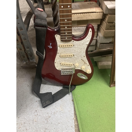 1094 - A RED AND IVORY WESTFIELD GUITAR (NO STRINGS)