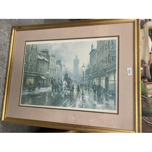 1102 - THREE GILT FRAMED PRINTS, TWO STILL LIFE FLOWERS AND FRUITS, THE OTHER A VICTORIAN STREET SCENE