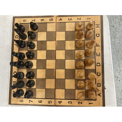 1114 - A FOLDING CHESS/BACKGAMMON SET WITH CHESS PIECES