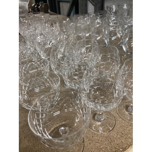 1156 - A VERY LARGE QUANTITY OF GLASSES TO INCLUDE WINE, SHERRY, BRANDY, COCKTAIL, PORT, LICQUOR, ETC