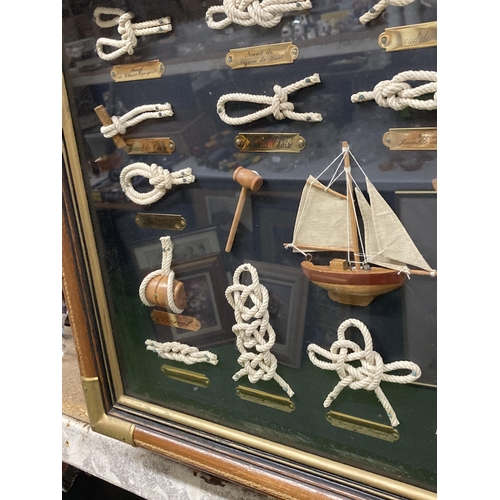 1162 - A NAUTICAL THEMED PIPCTURE OF SAILORS KNOTS