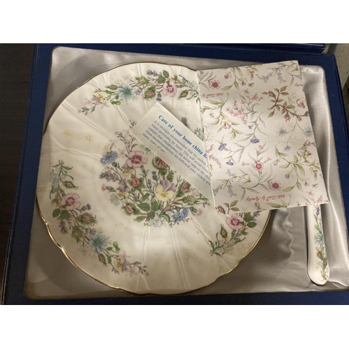 1185 - TWO BOXED AYNSLEY 'WILD TUDOR PLATES WITH KNIVES