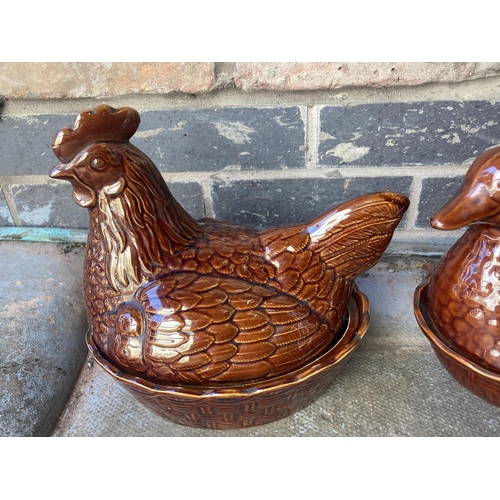 984 - A HEN AND A DUCK EGG CROCK IN TREACLE GLAZE