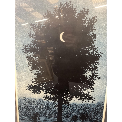 999 - A FRAMED MAGRITTE PRINT OF A SUPERIMPOSED CRESCENT MOON IN FRONT OF A TREE, TITLED LE SEIZE SEPTEMBR... 